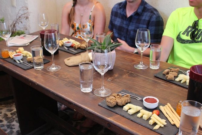 Private Santorini Cooking Class & Wine Tasting Tour - Santo Winery: caldera views and a bigger tasting room