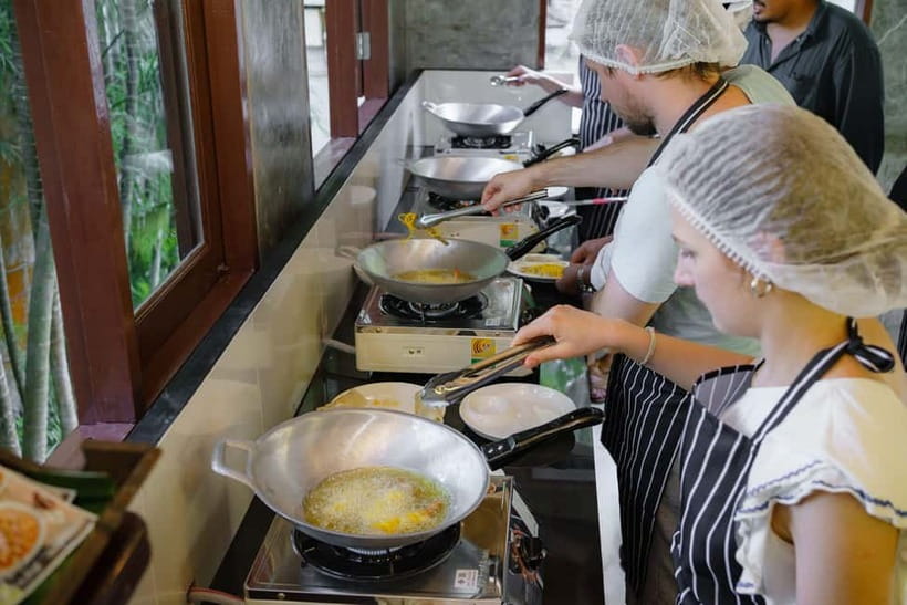Railay: Hands-On Thai Cooking Class at Railay Beach - Chopping, slicing, stirring, and cooking your own food