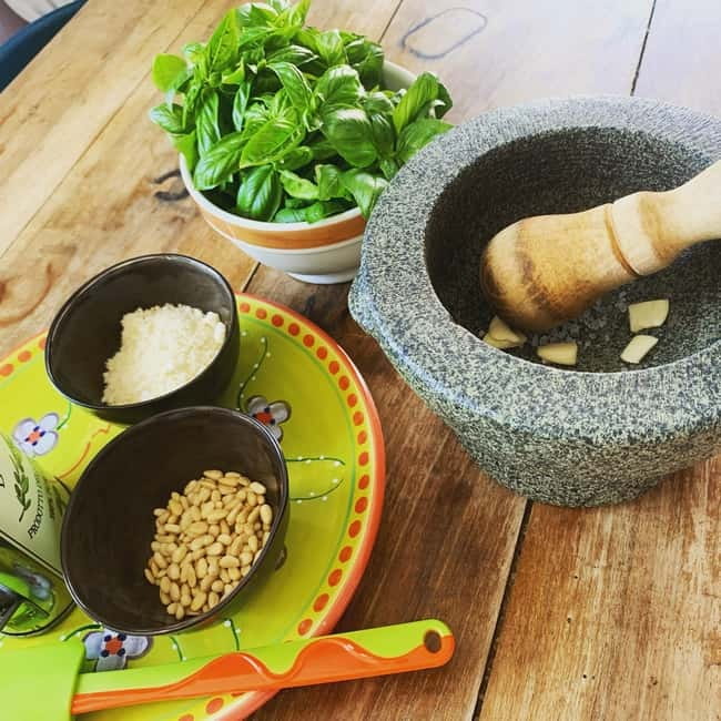 Riomaggiore: Pasta and Tiramisù Cooking Class - Grinding Ligurian pesto by hand