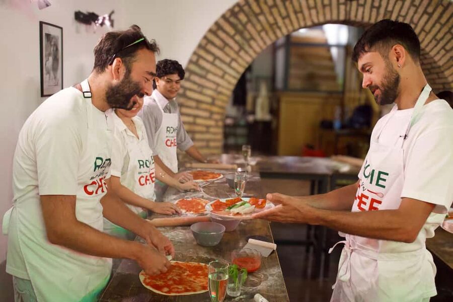 Rome: Hands-On Pizza Cooking Class with Spritz Mixology - Sitting down for a shared Roman dinner