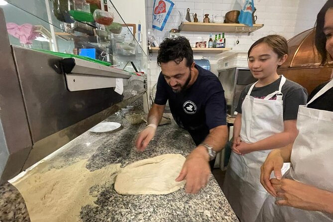 Rome: Neapolitan Pizza Cooking Class in Front of the Vatican - Eating your pizza with a drink