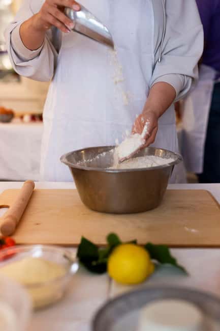 Rome: pasta and tiramisu cooking class in the city center - Sitting down to eat what you made