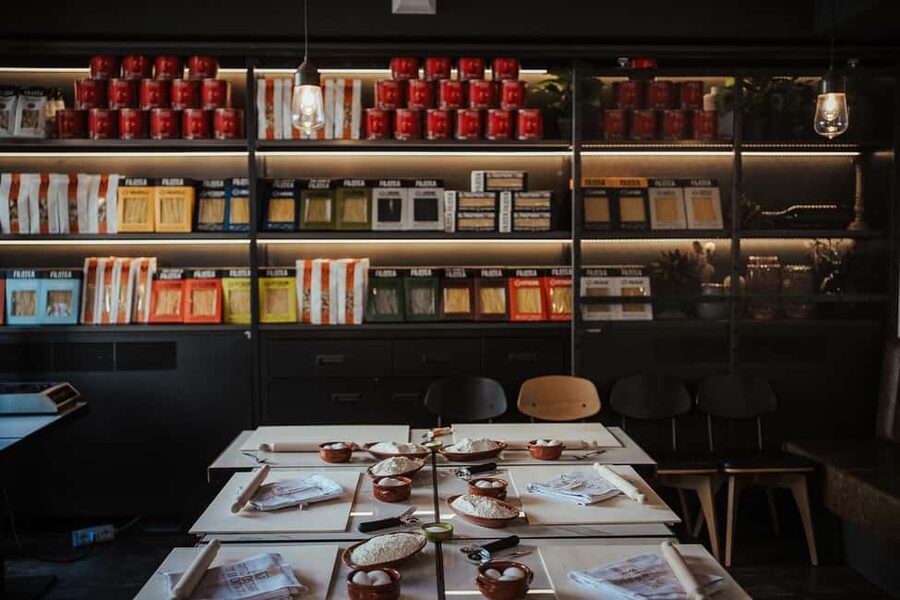 Rome: Pasta and Tiramisu Cooking Class with Spritz and Wine - Sitting down to eat your own cooking