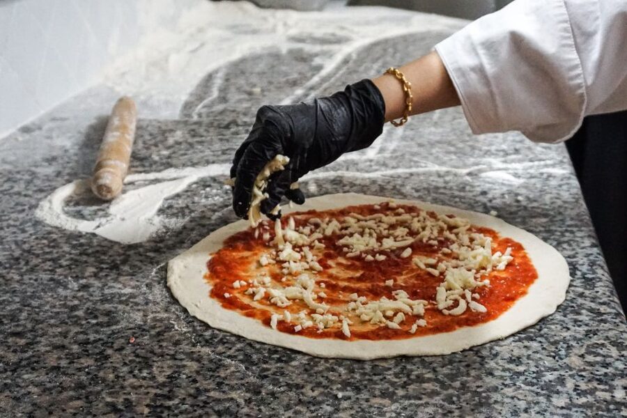 Rome: Pizza and Tiramisu Cooking Class in Piazza Navona - Sitting down to eat what you made