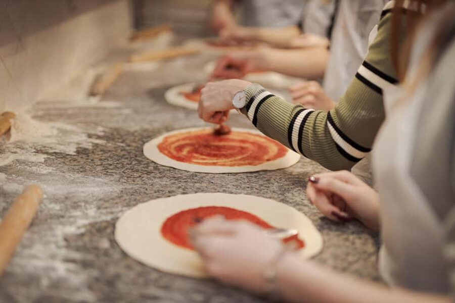 Rome: Pizza Cooking Class in Piazza Navona with Drinks - Making the dough and shaping your pizza