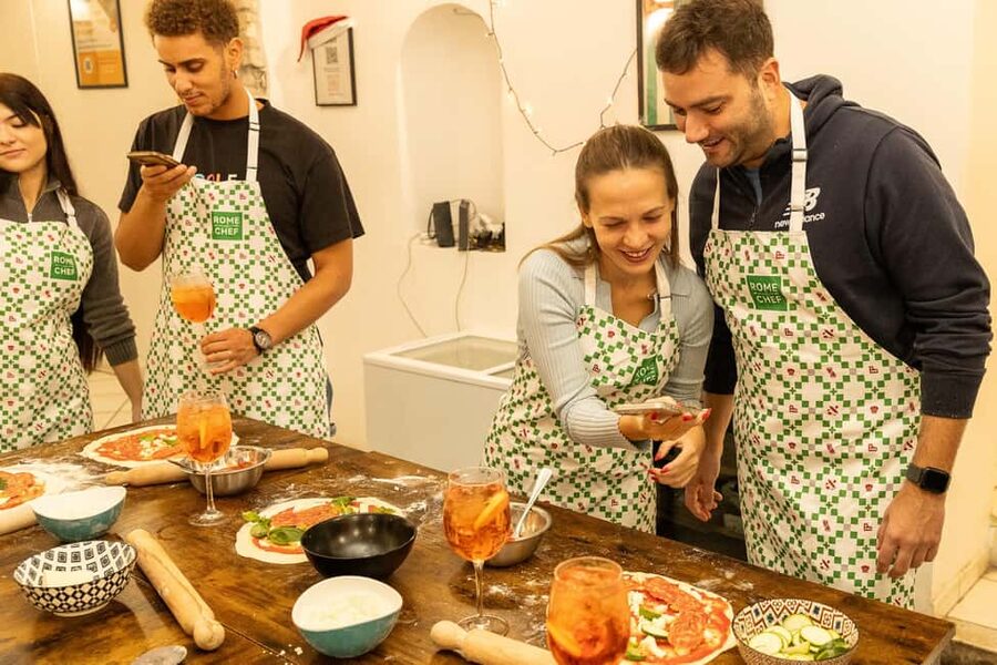 Rome: Pizza Making Cooking Class With Spritz Cocktails - The chefs shape the experience