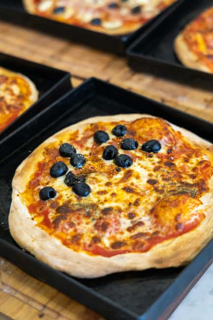 Rome: Pizza & Tiramisu Cooking Class with Meal and Drink - Preparing traditional tiramisu