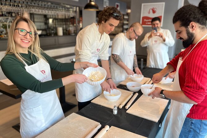 Rome Small Group Pasta Making Class with Wine and Italian Chef - Eating the fettuccine you just made