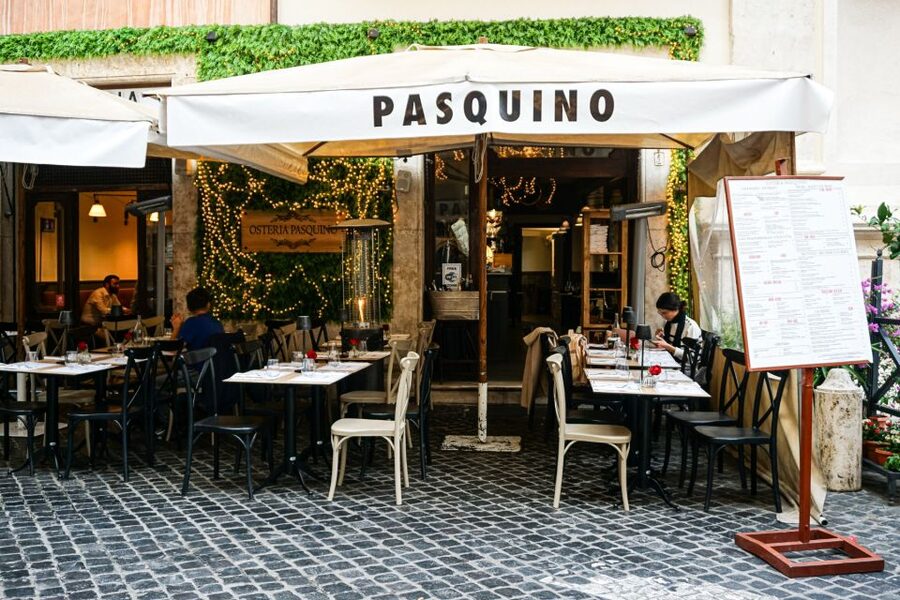 Rome: Traditional Pizza Cooking Class near Piazza Navona - Baking your pizza and sitting down to eat