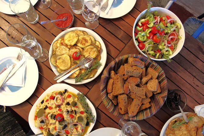 Santorini Family Farm Food & Wine Tour with Cooking Class - Eating under the family tree