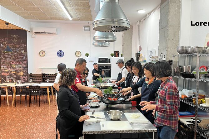 Seafood paella cooking class, tapas and visit to Ruzafa market. - Shopping for paella at Mercado de Ruzafa