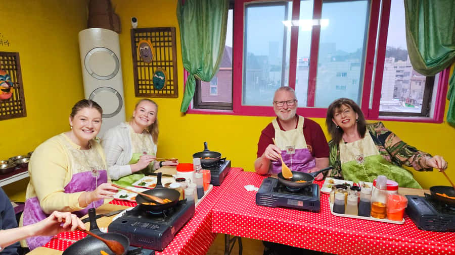 Seoul: Korean Cooking Class at a Local Home and Market Tour - Korean phrases, a Tal mask, and small cultural details