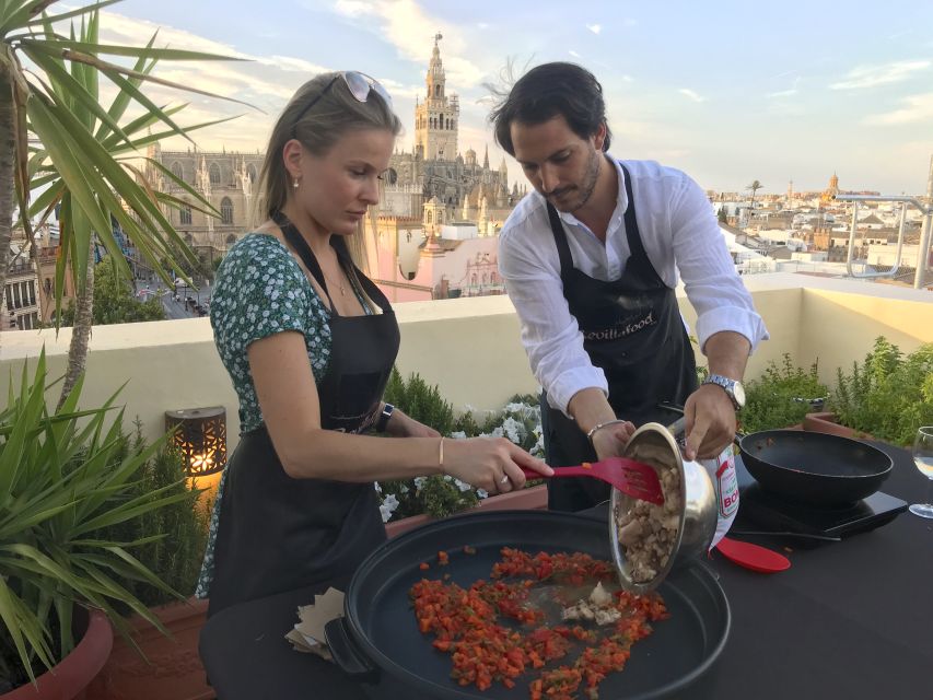 Seville: Paella Cooking Class & 30-Min Local Expert Q&A - A welcome drink starts the evening