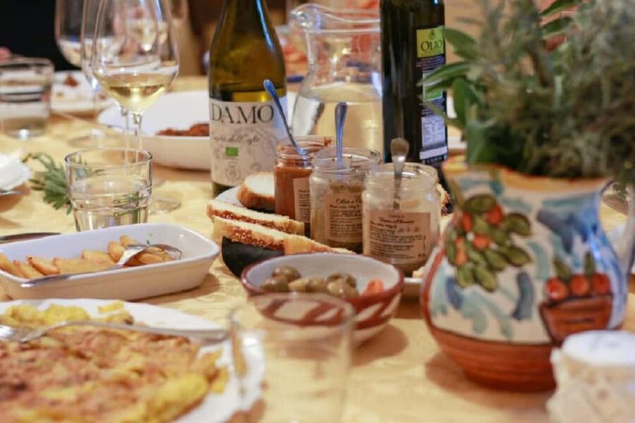 Sicilian cooking class in the historic baglio Florio Adamo - Sitting down with Adamo wine