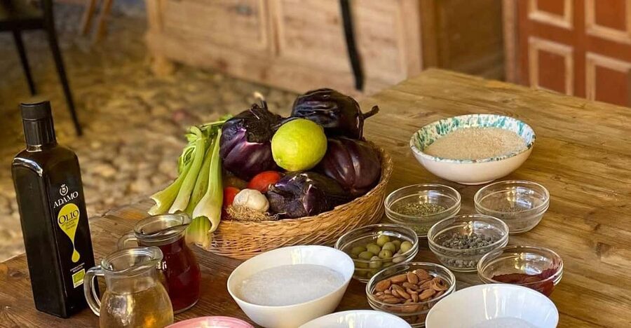 Sicilian cooking class in the historic baglio Florio Adamo - Preparing caponata, arancine, and bruschetta
