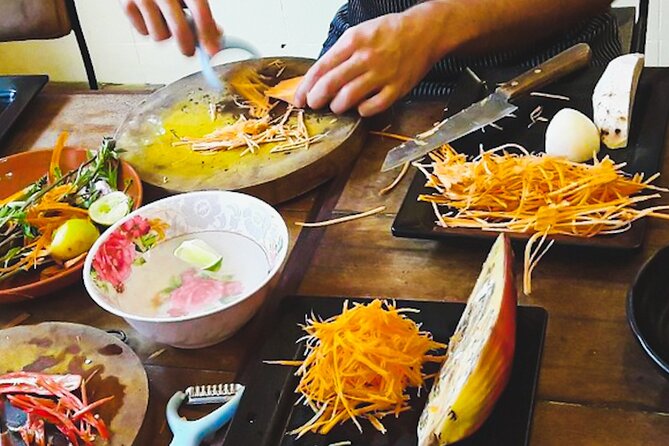 Siem Reap Cooking Class - Cooking with Chef Dee in a garden setting