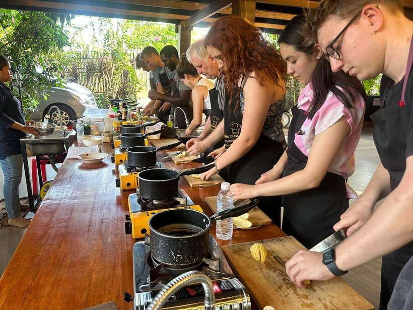 Siem Reap: Khmer Cooking Class at a Local's Home - Cooking four dishes in a busy but friendly kitchen