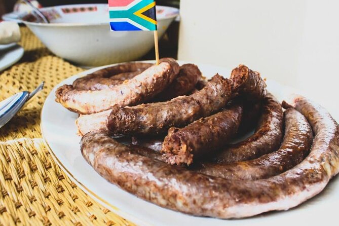 South African Cooking Class in Cape Town with a Local Family - Sitting down for the meal you helped prepare