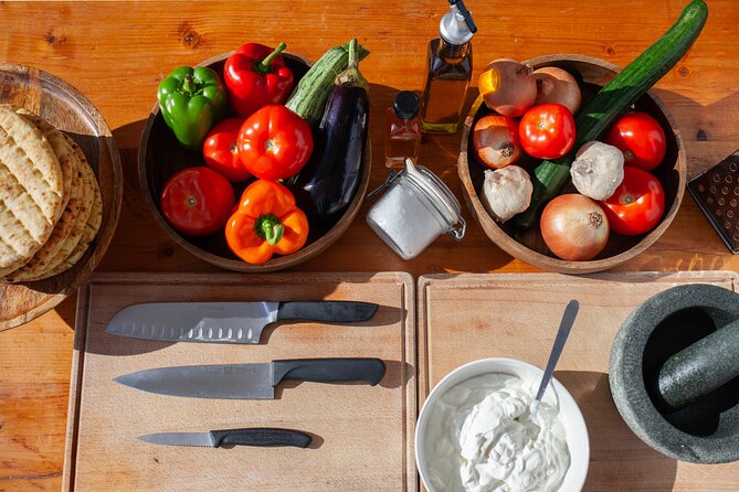 Souvlaki Cooking Class with Locals – Transfer Included - Preparing pork, chicken, vegetables, and pita