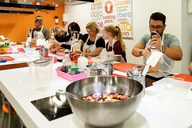 Spanish Cooking Class Paella Tapas and Sangria in Madrid - A small group keeps the cooking personal