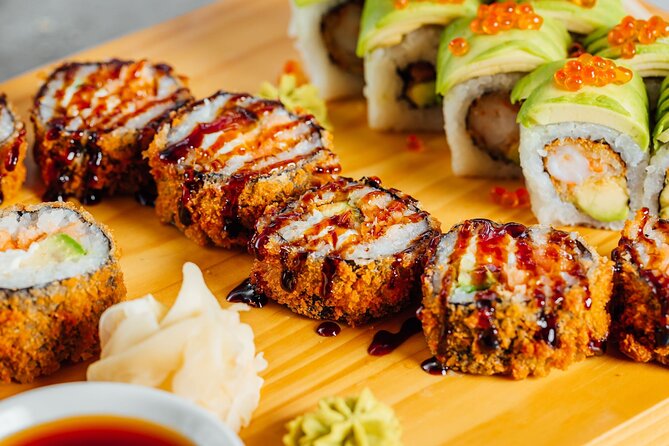 Sushi Making Cooking Class at a Local Brewery in Charlotte - Rolling the spicy tuna creation