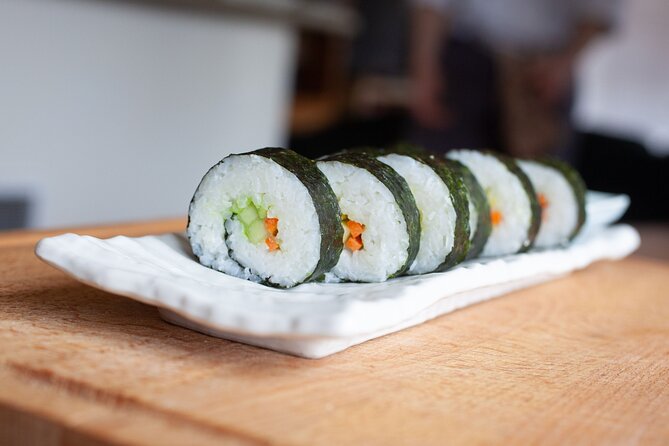 Sushi Making Cooking Class at a Local Brewery in Charlotte - Building the cucumber and avocado roll