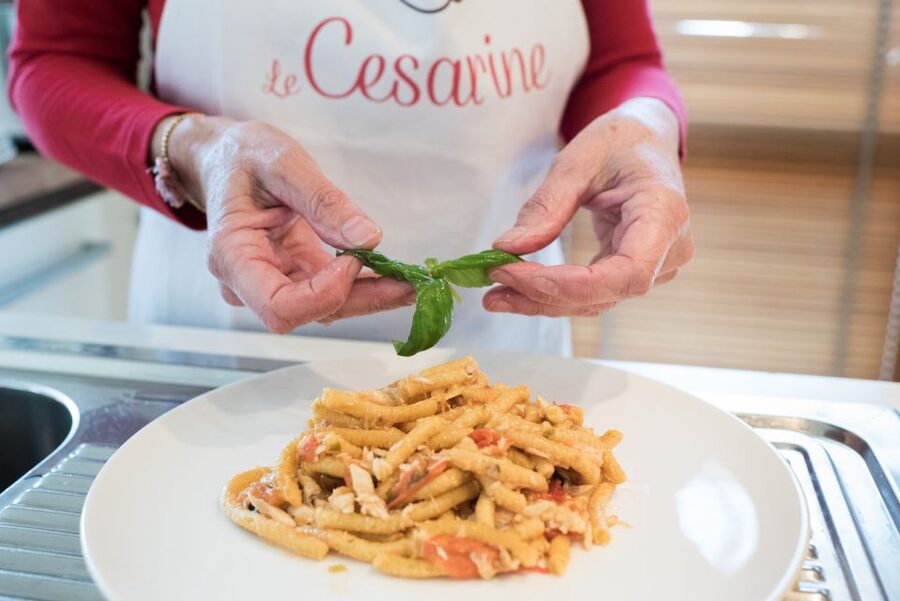 Taormina: Pasta & Tiramisu Cooking Class at a Local's Home - Sitting down for the food you made