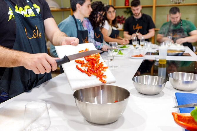 Tapas & Paella Cooking Class in Madrid with a Professional Chef - Steaming cod in ajoarriero style