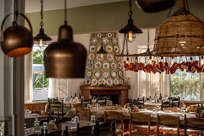 Tasting Rhodes: Cooking Class, Wine Tasting & more in an Authentic Greek village - Sitting down to eat what you made