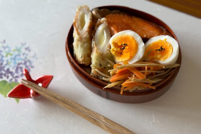Tokyo Haneda: Bento & Ramen Gyoza Cooking Class in a Local home - Free-flow drinks and the meal afterward