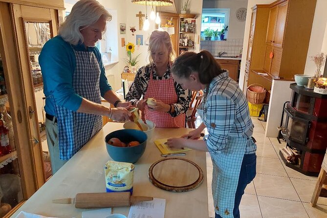 Traditional Alpine and Austrian Cooking Class in Rankweil - A summer garden tour before the cooking begins