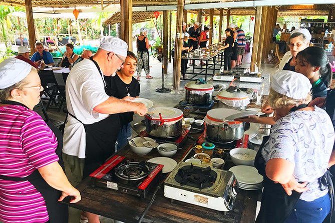 Traditional Cooking Class with Basket Boat Ride and market Tour - Cooking four Vietnamese dishes in one class