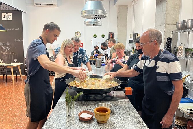 Valencian paella cooking class, tapas and visit to Ruzafa market. - Making sangria before making paella