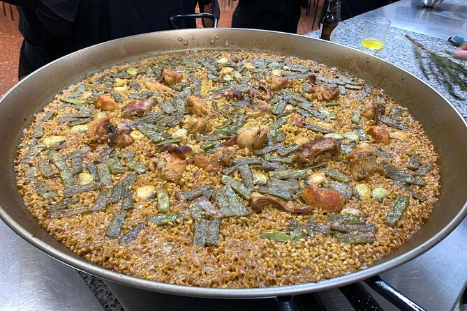 Valencian Paella Cooking Class, Tapas & Sangria - Evening - Cooking Valencian paella with the group