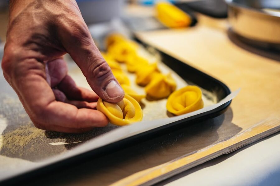 Venice: Pasta and Tiramisu Cooking Class at a Local's Home - Rolling pasta dough by hand
