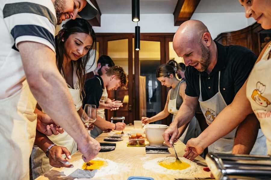 Venice: Pasta and Tiramisu Cooking Class at a Local's Home - Sitting down with the host family