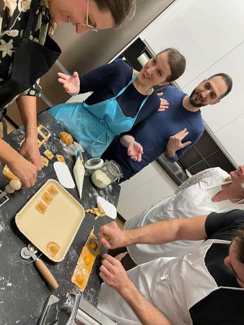 Verona: Authentic Pasta Making Class with a Local Family - Sitting down for the three-course dinner